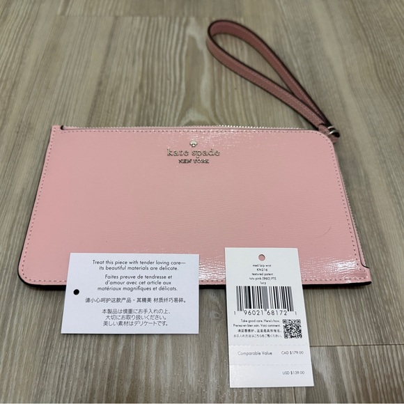 kate spade Handbags - Kate Spade Light Pink Wristlet Clutch